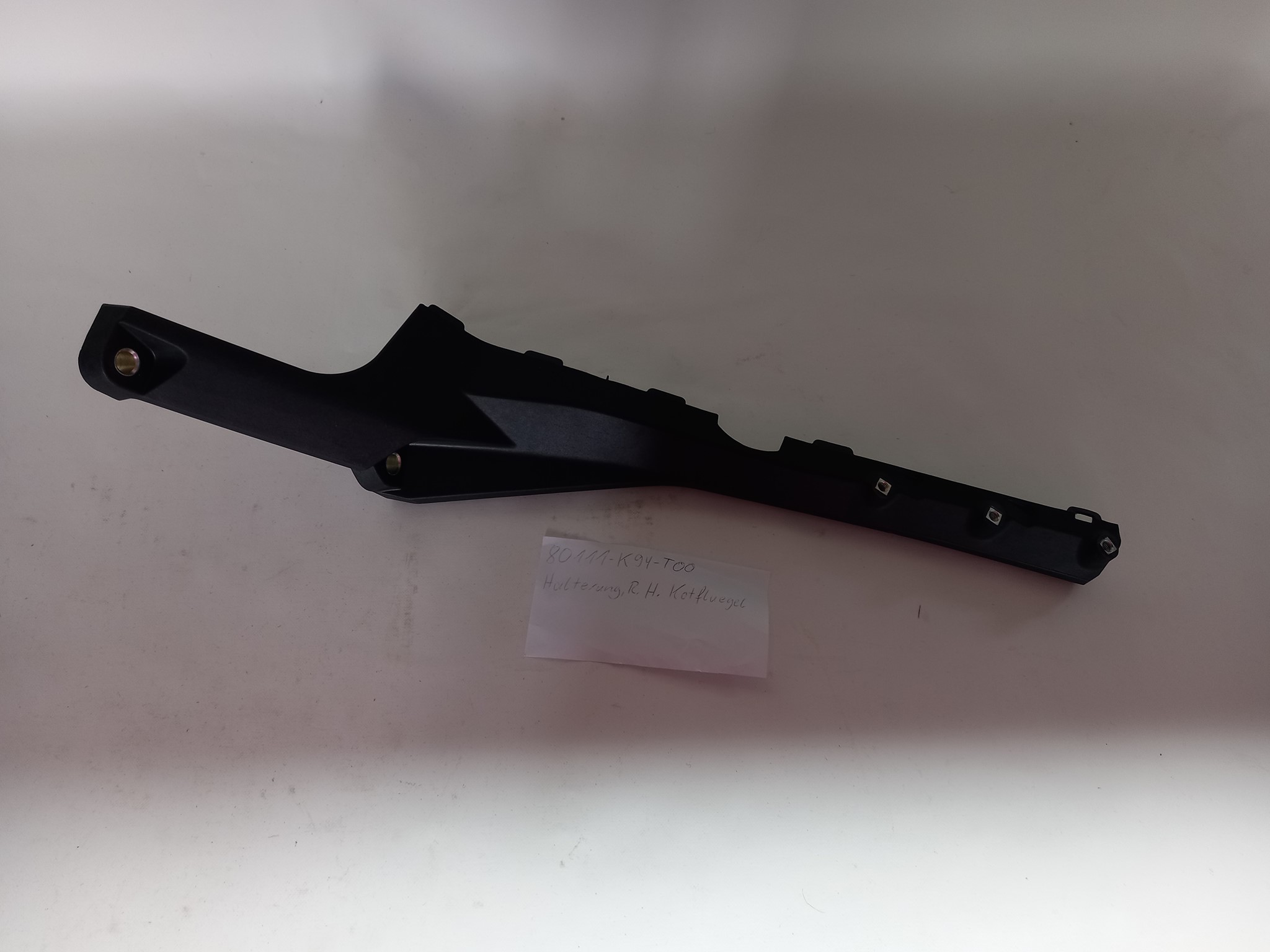 Bild von Honda  HALTERUNG, R. H. KOTFLUEG  80111-K94-T00